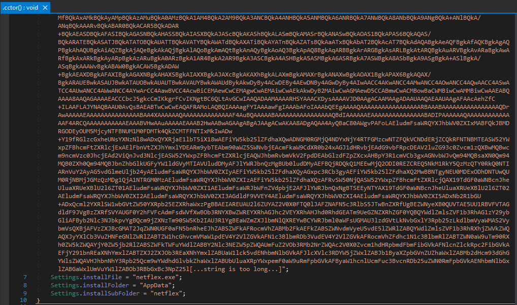 DNSpy showing base64 encoded payload blob and target drop path in loader