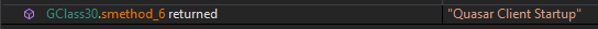 DNSpy debugger showing decrypted string value confirming Quasar RAT identity